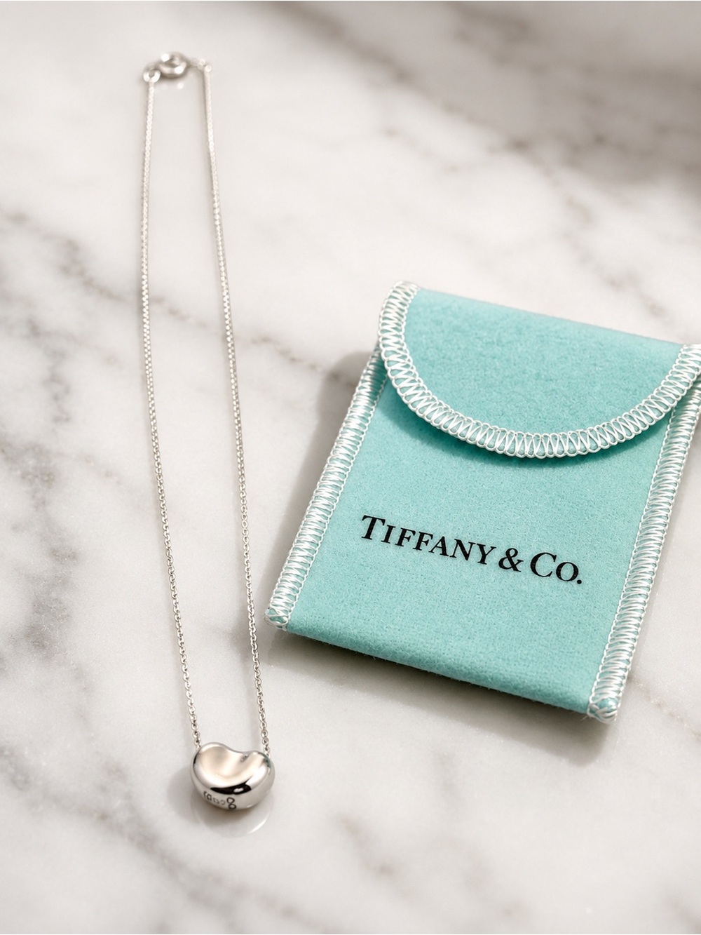 Authentic Tiffany & Co. Sterling Silver Small Bean Pendant Necklace - Silver